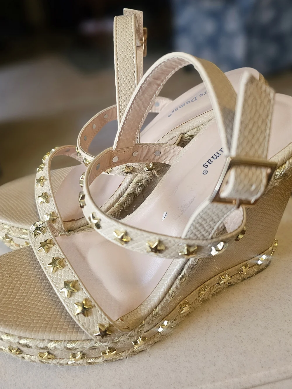 Brand new and never worn, but please note there is a minor scuff/dark mark on th